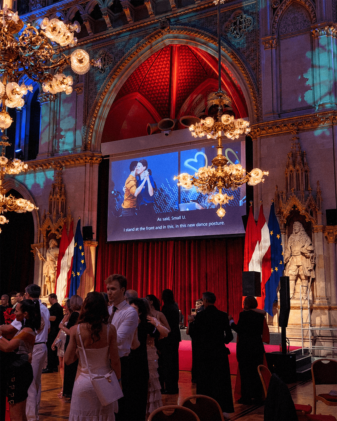 aktive.chat live event translation interface shown on a venue screen